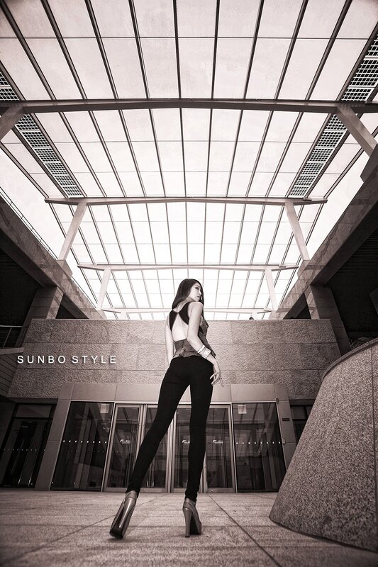 Woman in high heels at modern building