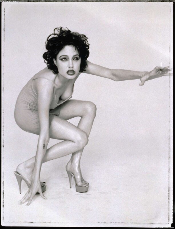woman in high heels crouching