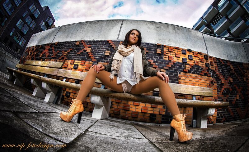 Woman in high heels on bench