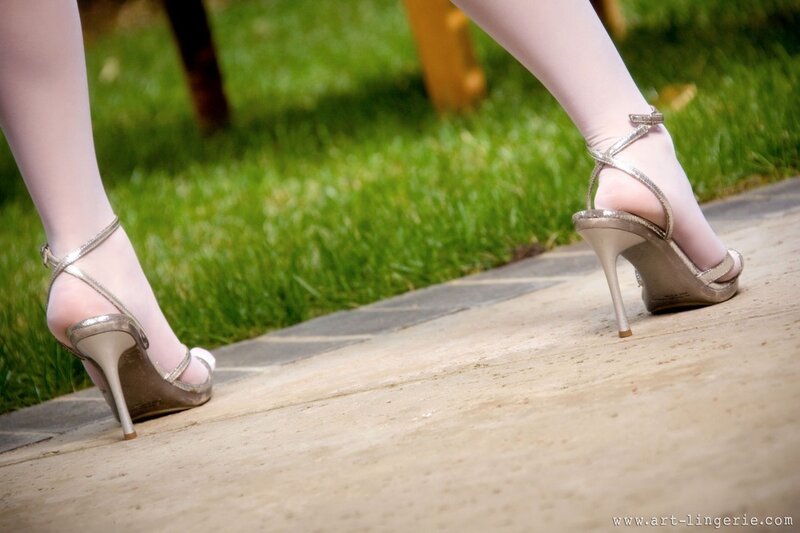 woman in high heels on path