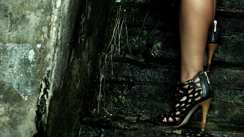 woman in high heels on steps