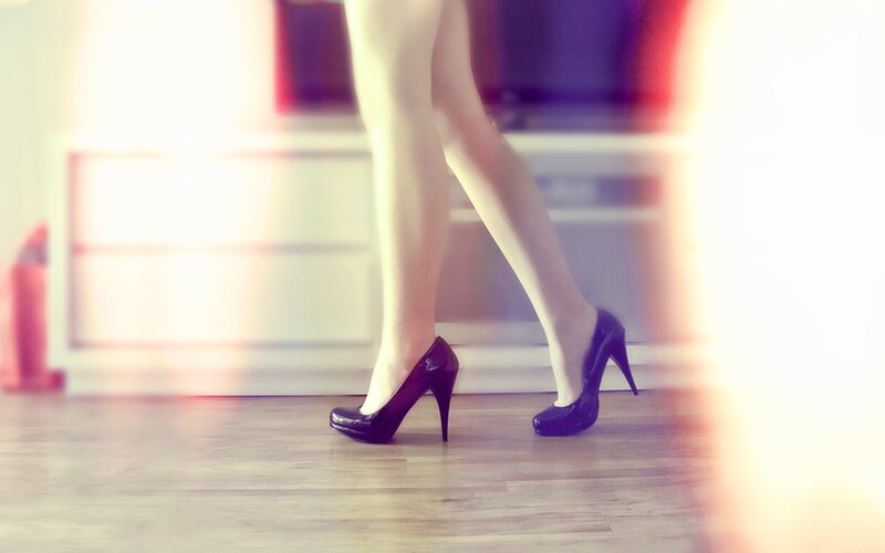 woman in high heels walking