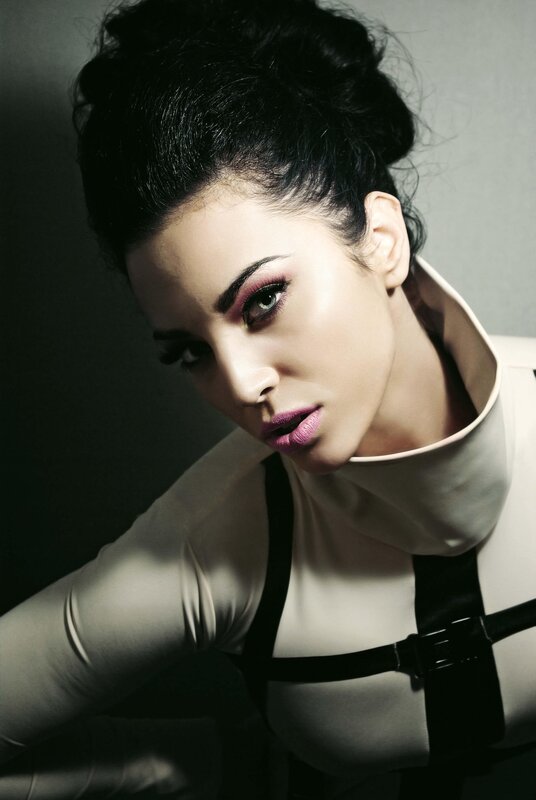 woman in high-neck outfit