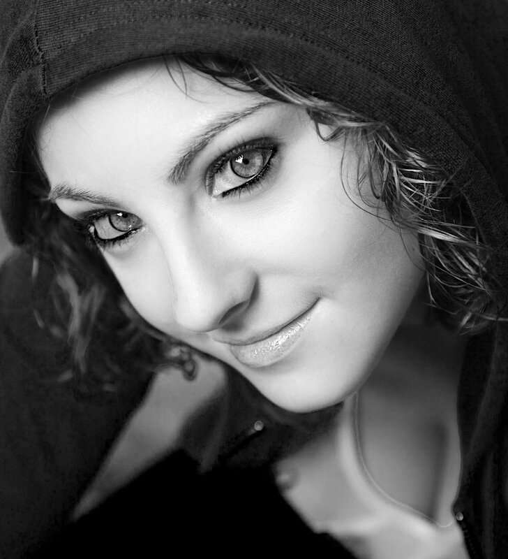 woman in hood smiling