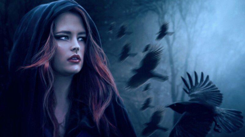 woman in hood with crows