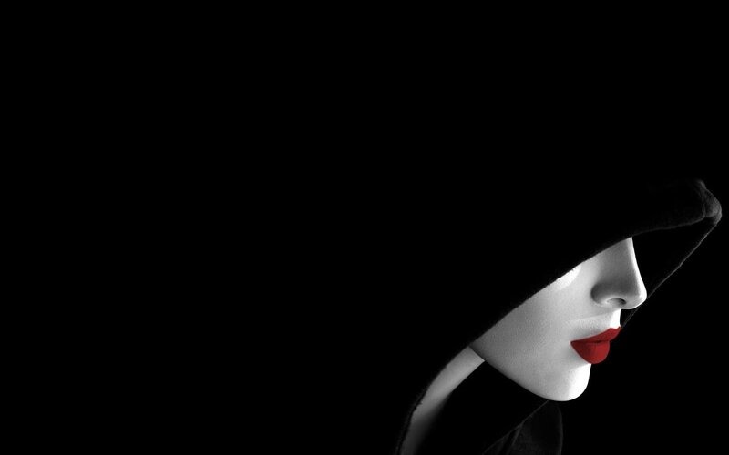 woman in hood with red lips