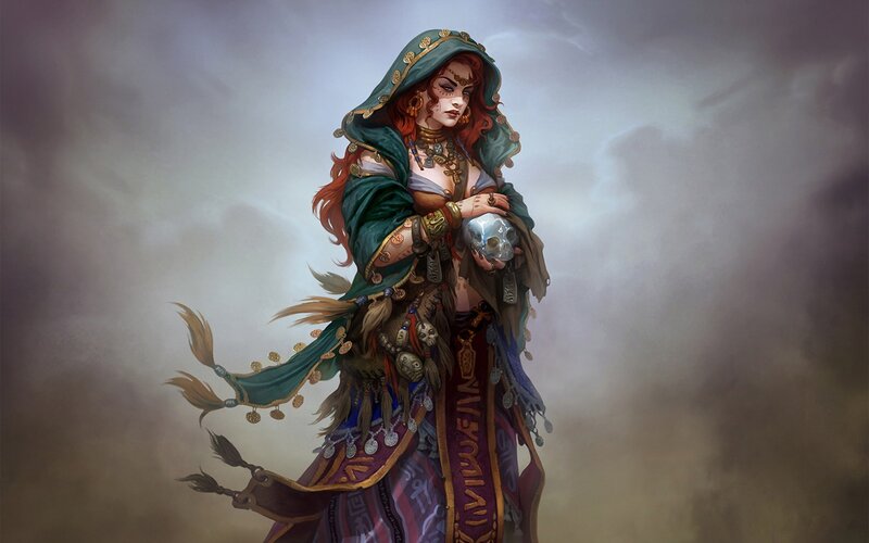 Woman in hooded cloak holding skull