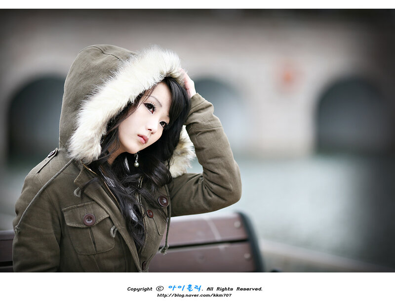 Woman in Hooded Coat — Green
