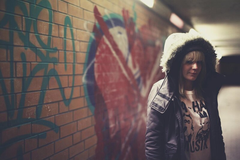 woman in hooded jacket