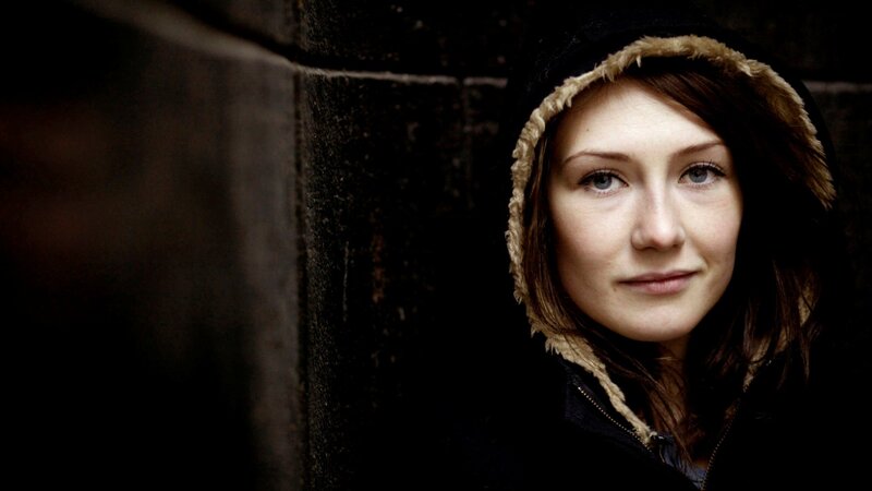 woman in hooded jacket