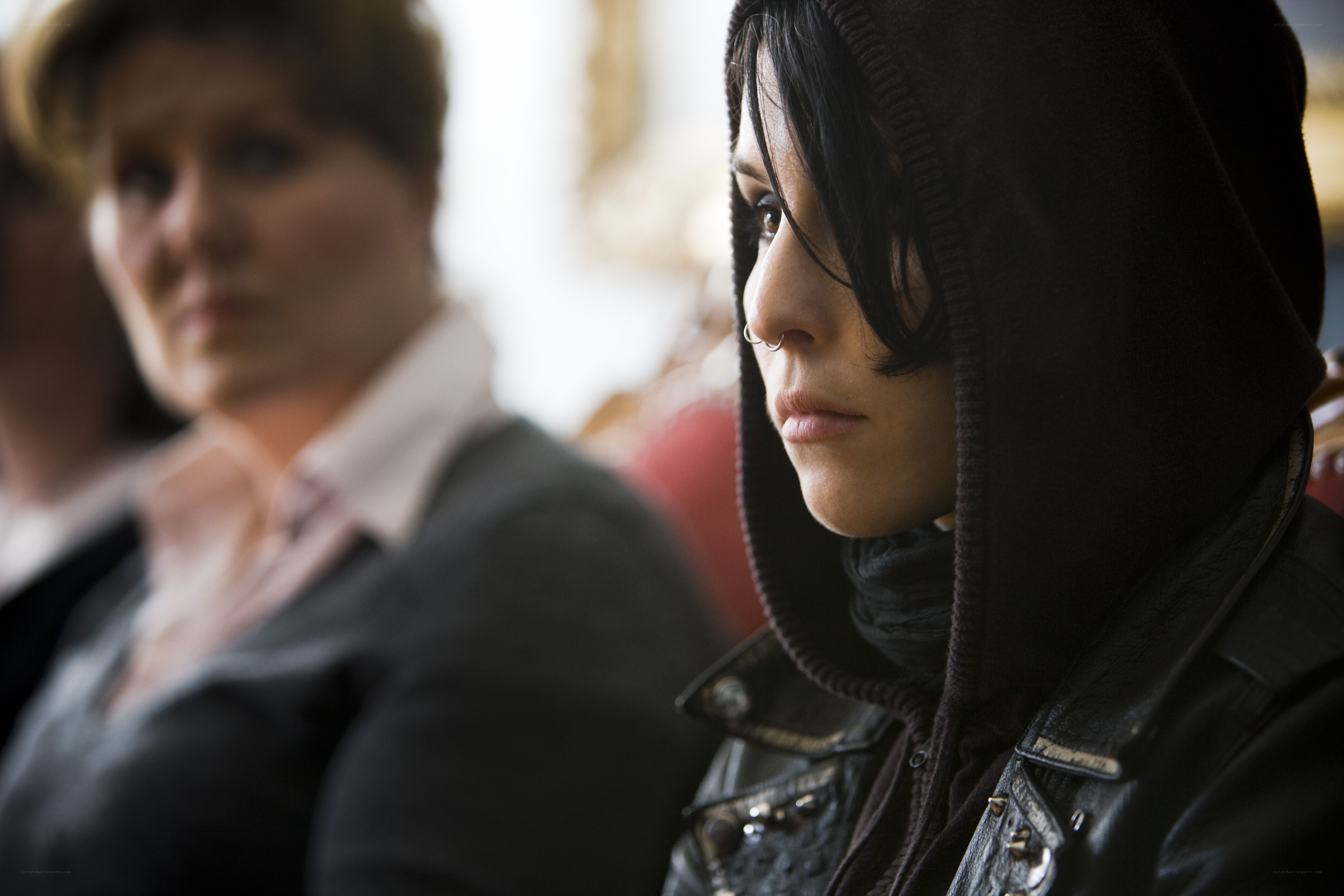 Woman in hooded jacket