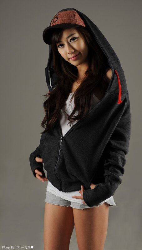 woman in hoodie and cap