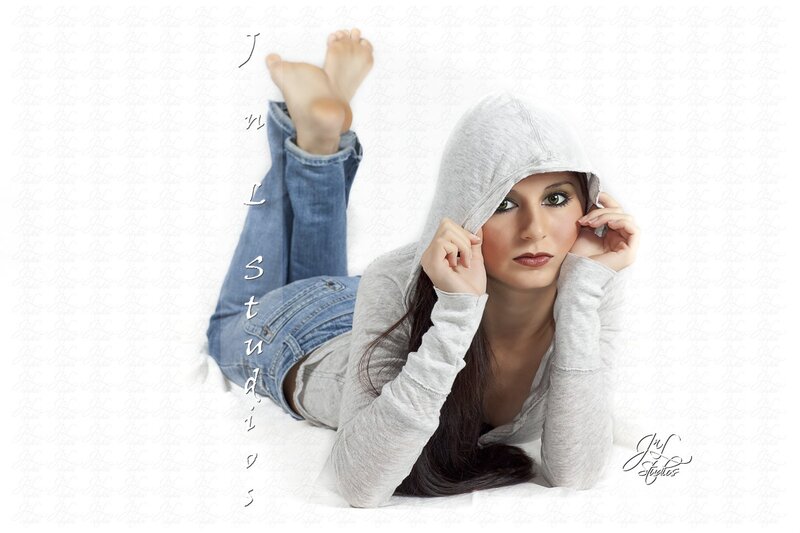 woman in hoodie lying down