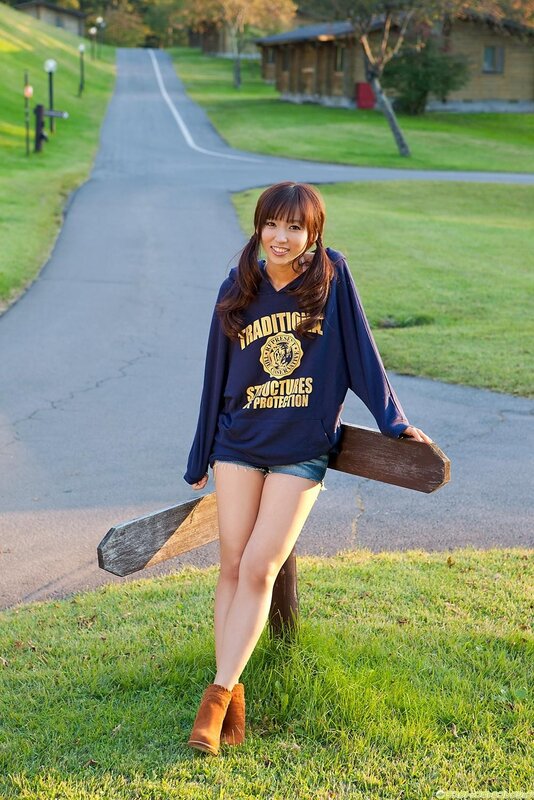 Woman in hoodie on a path