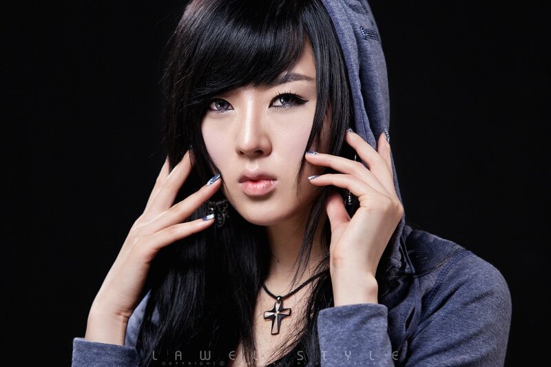 woman in hoodie with dark hair