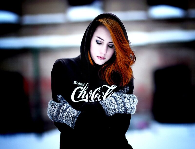 woman in hoodie with red hair