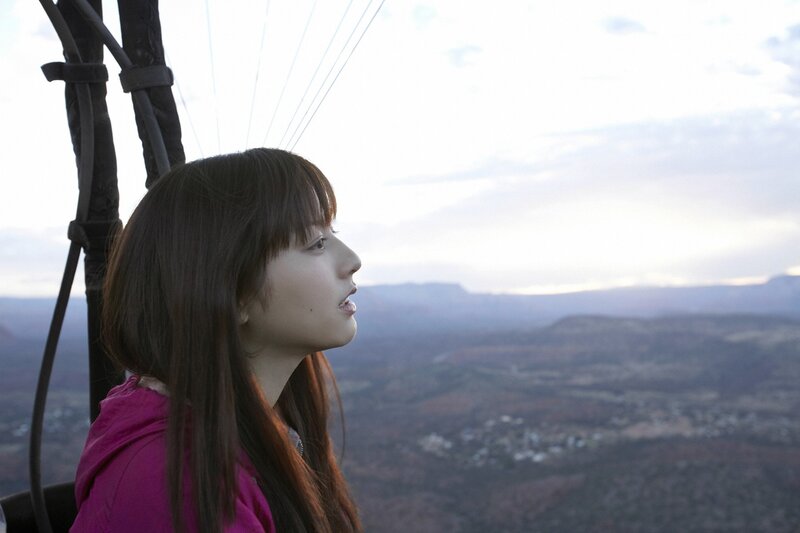 Woman in hot air balloon