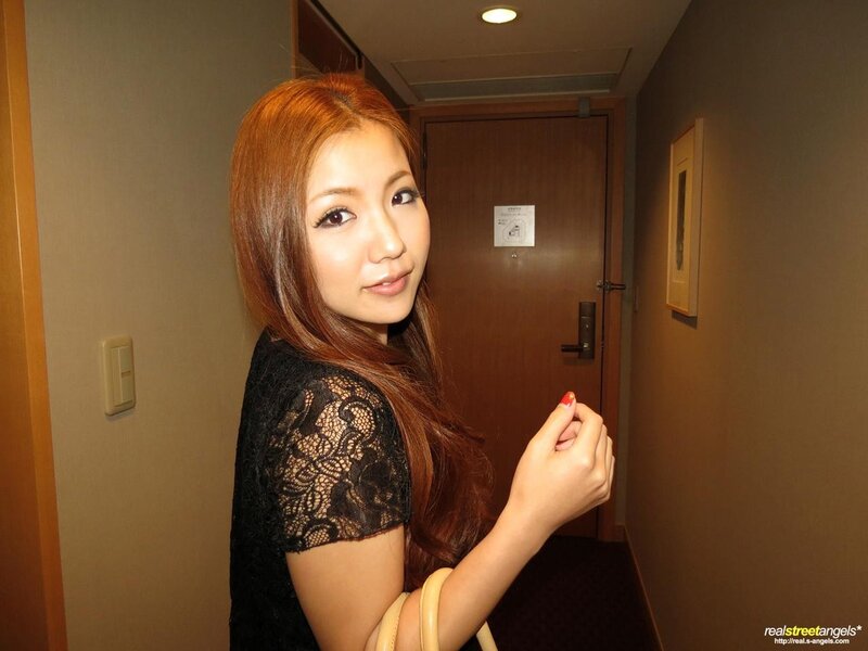 Woman in hotel hallway