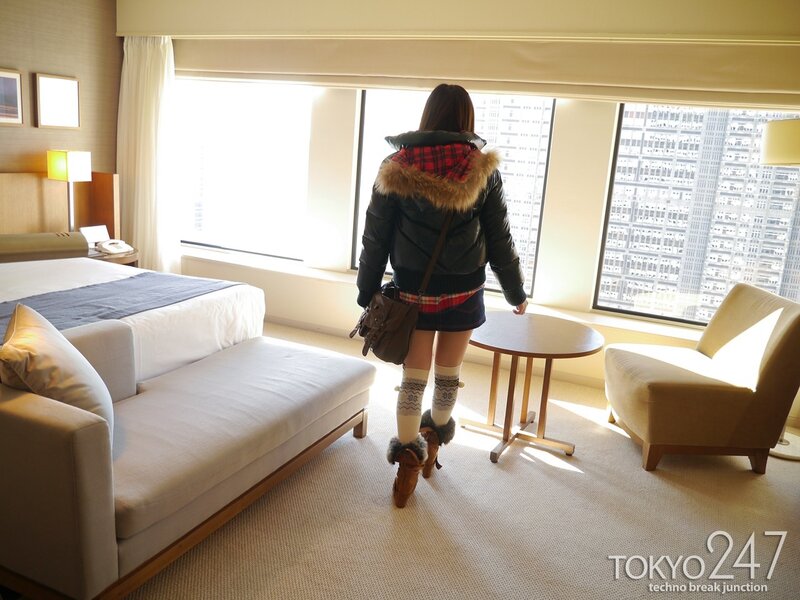 Woman in hotel room