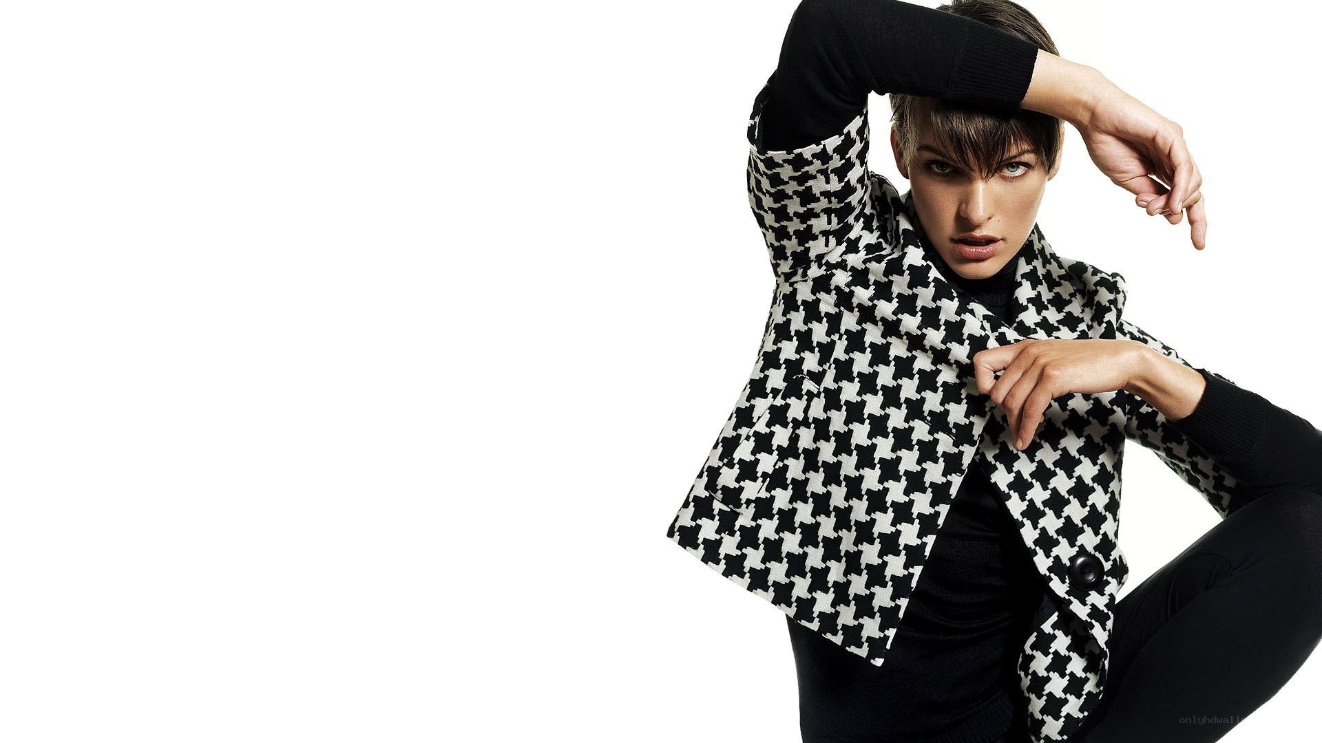 woman in houndstooth jacket