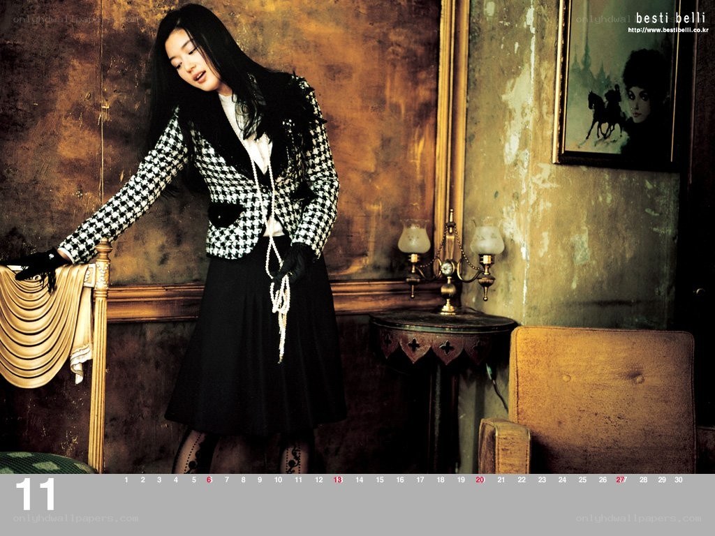 woman in houndstooth jacket