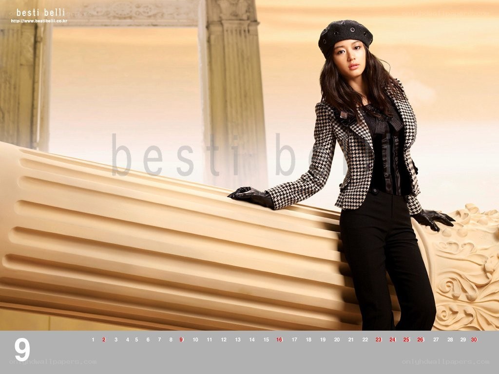 woman in houndstooth jacket
