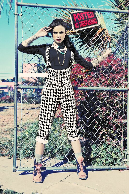 woman in houndstooth overalls