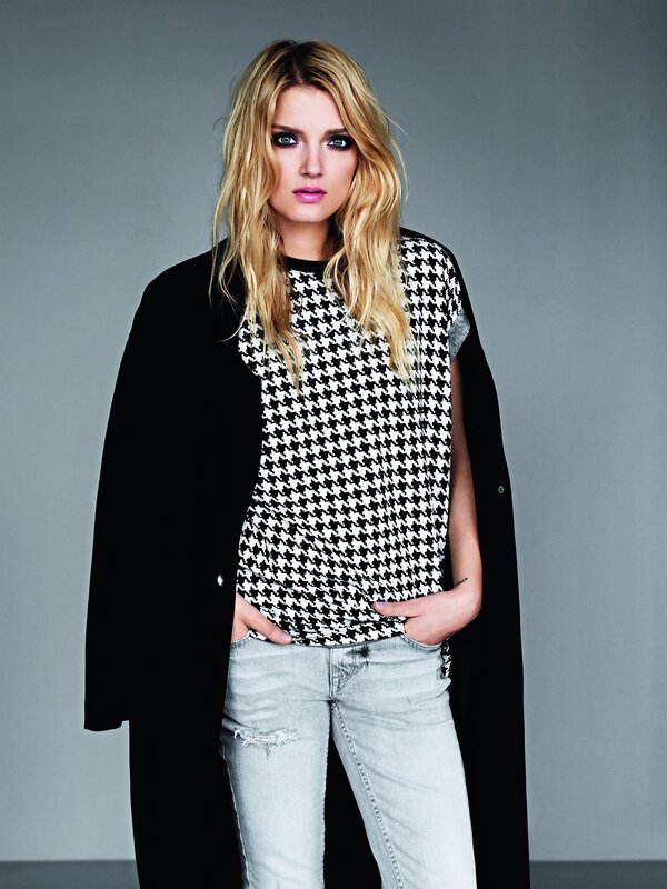 woman in houndstooth top