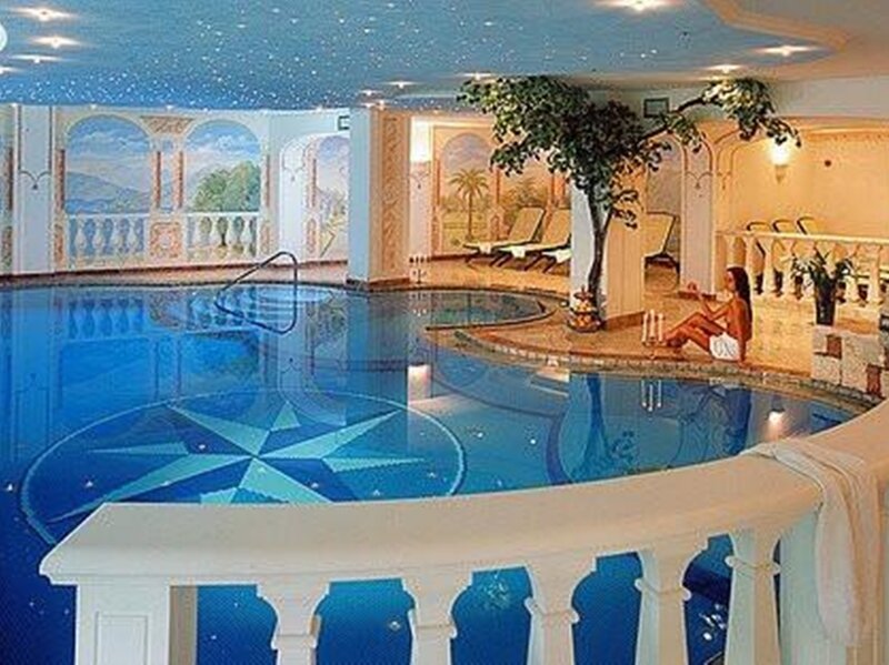 Woman in Indoor Pool — Blue