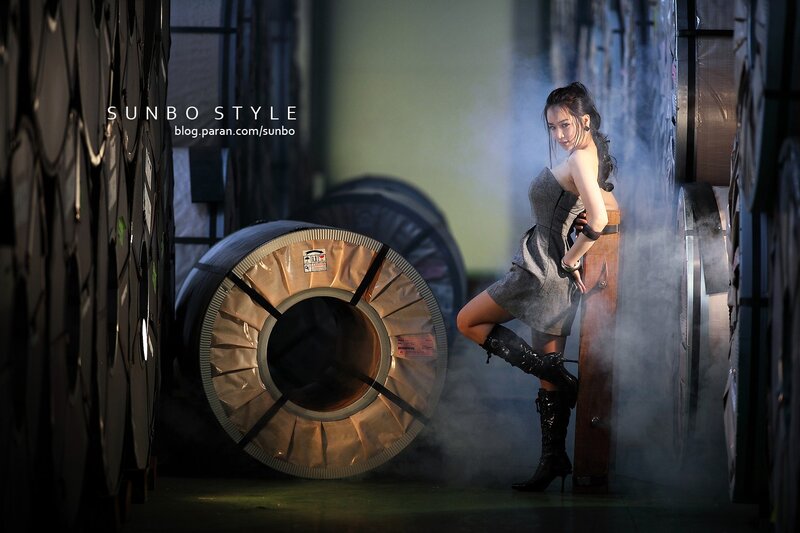 Woman in industrial setting