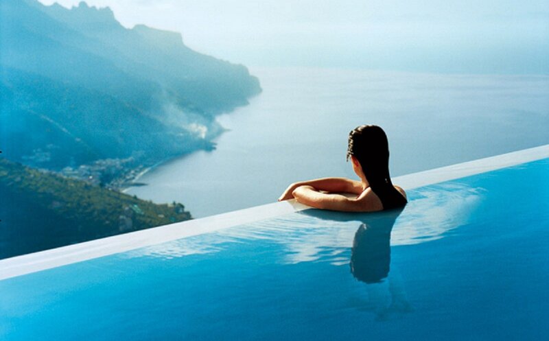 Woman in Infinity Pool — Blue, Serene, Afternoon, Photograph, Sea