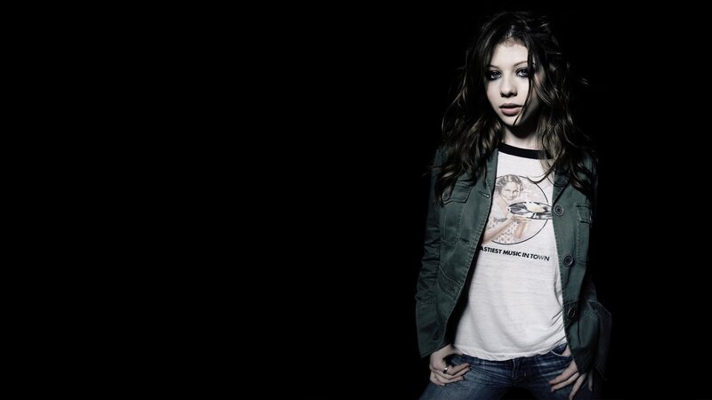 woman in jacket and t-shirt
