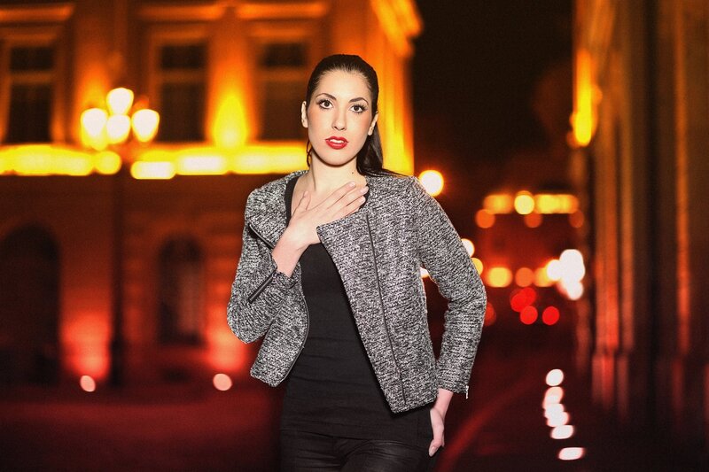 woman in jacket at night