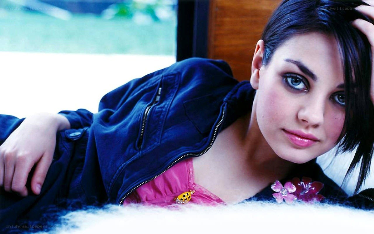 woman in jacket lying down