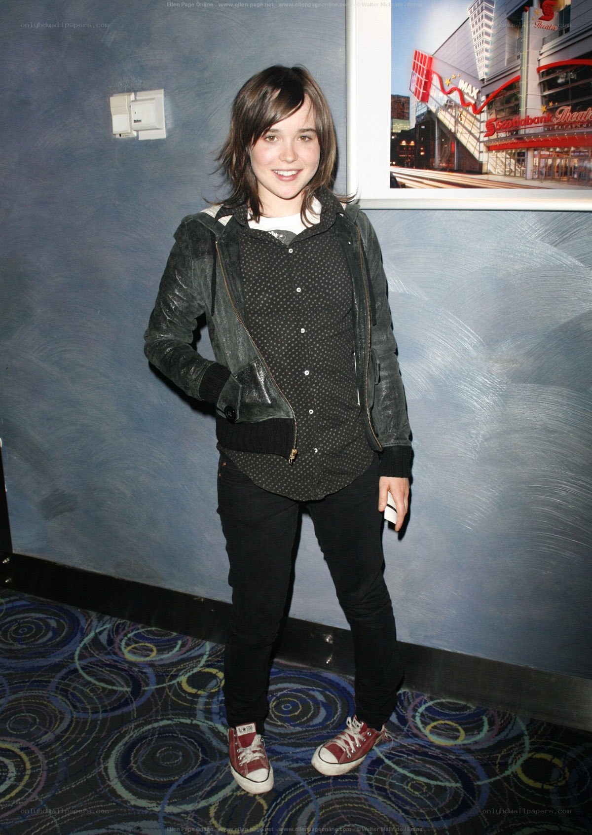 woman in jacket smiling