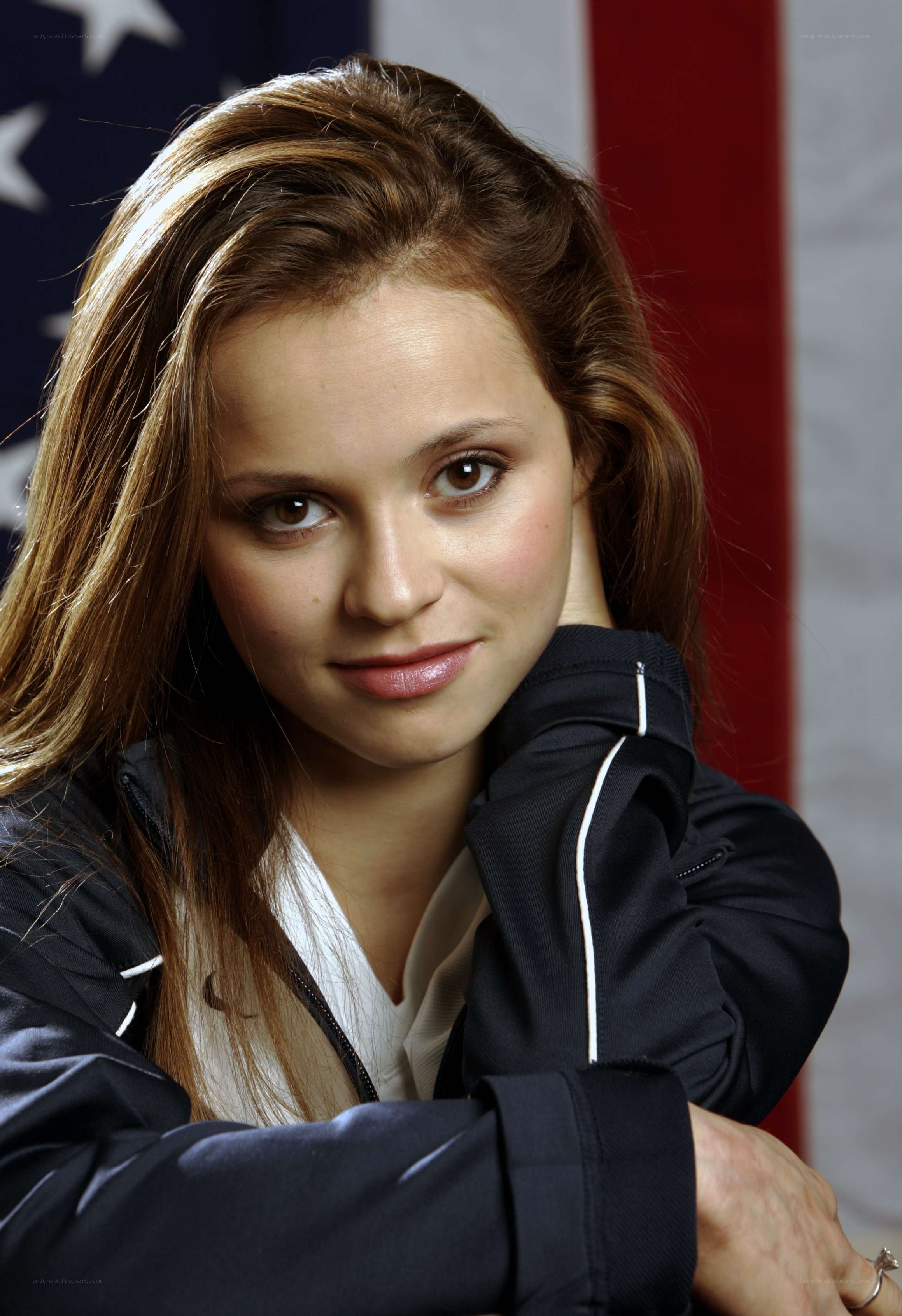 woman in jacket with flag