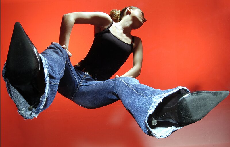 woman in jeans and boots