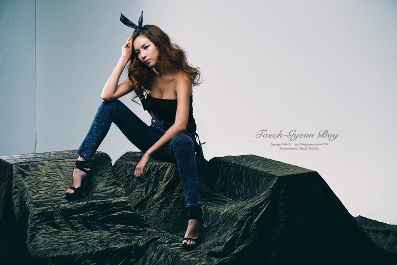 woman in jeans and heels