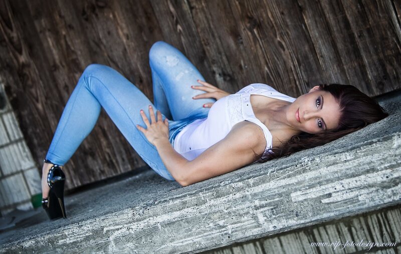 woman in jeans and heels