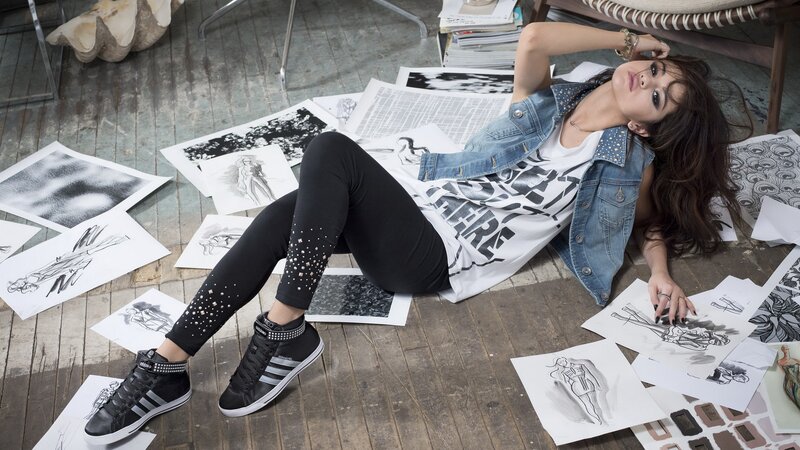 woman in jeans and sneakers
