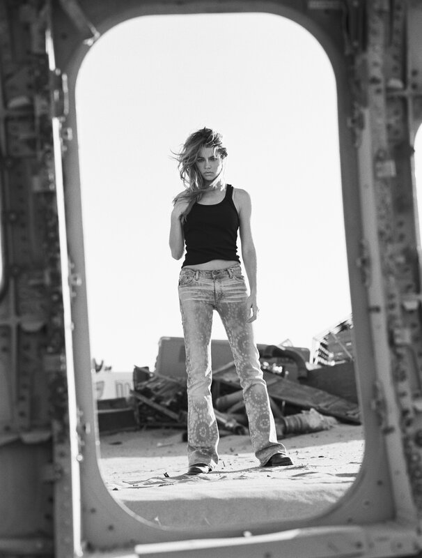woman in jeans and tank top