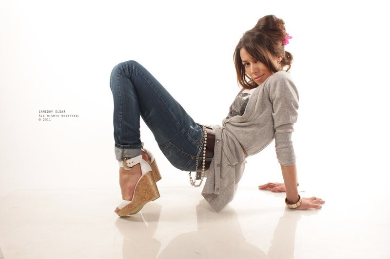woman in jeans and wedges