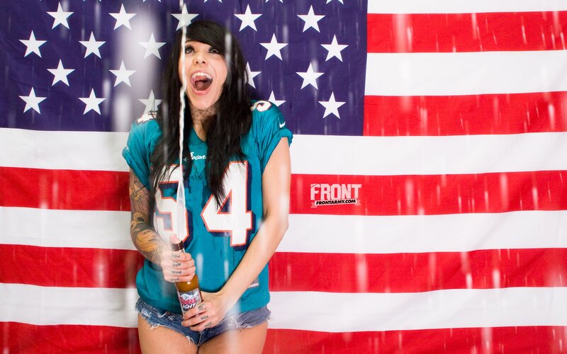 woman in jersey with beer