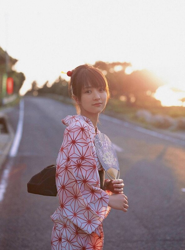 Woman in kimono at sunset