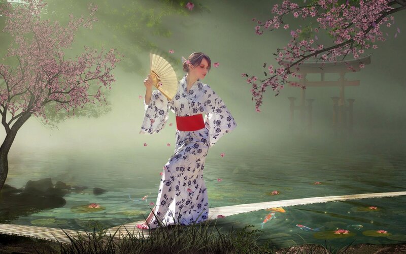 Woman in kimono by pond