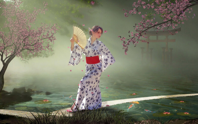 Woman in kimono by pond