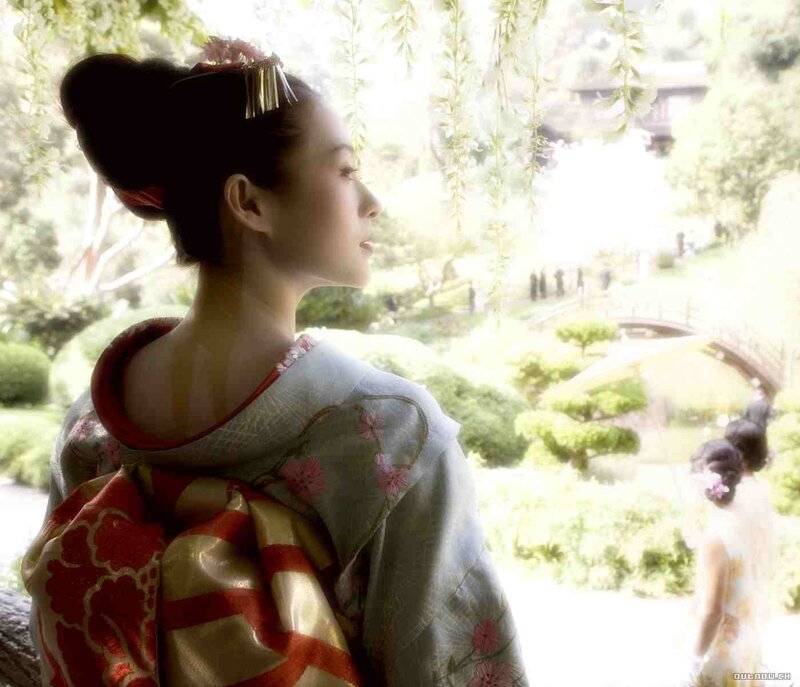 Woman in kimono in garden