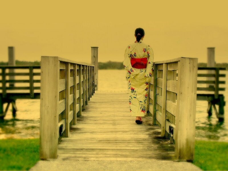 Woman in kimono on a dock