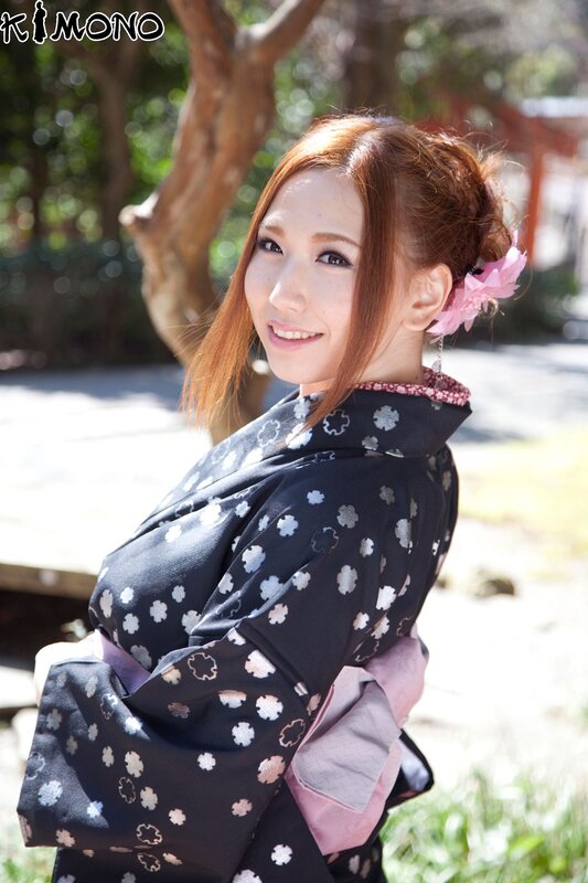 Woman in kimono outdoors