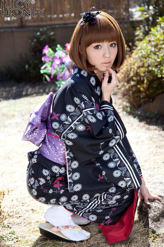 Woman in kimono outdoors